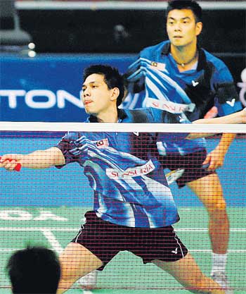 Also through are Chan Chong Ming (back) and Chew Choon Eng.