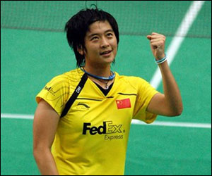 Lin Wang of China reacts after defeating Saina Nehwal by 21-16, 21-19 in the quarter-finals at the World Badminiton Championships.