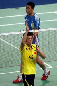 True grit: China's Lin Dan acknowledging the cheers from the crowd after beating South Korea's Park Sung-hwan 21-16, 21-15 in the first singles yesterday. China went on to win 3-0 to reach the semi-finals