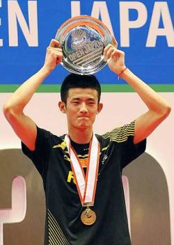 Earning respect: China&rsquo;s Chen Long raising his winning plate on the podium after he won the Japan Open men&rsquo;s singles title by beating Malaysia&rsquo;s Lee Chong Wei 21-8, 10-21, 21-19 in the final on Sunday.