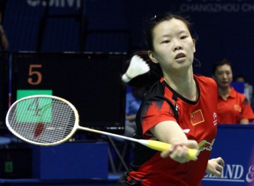 World number-one Li Xuerui, shown September 14, 2013, has pulled out of the badminton Japan Open because of a sore knee, with her teammate linking the problem to a jam-packed schedule for Chinese players.