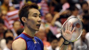 Top-seeded Lee Chong Wei acknowledges the cheers after his victory over Kenichi Tago in the men's singles final match at the Japan Open. Lee won 23-21, 21-17.