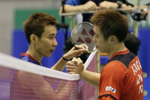 Kenichi Tago (right) congratulating Lee Chong Wei after clinching the Japan Open title in Tokyo on Sunday. Chong Wei beat Tago 23-21, 21-17.