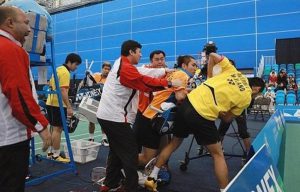 Coaches desperately try to break up the remarkable brawl between the two badminton players during the doubles final of the Canada Open in July