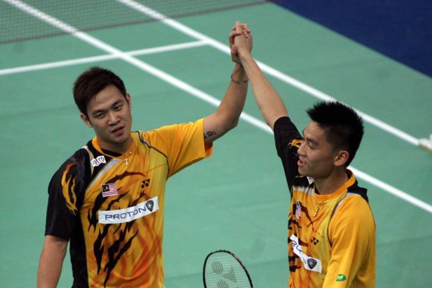 Happier times: The pairing of Koo Kean Keat-Tan Boon Heong, seen here at the 2010 Thomas Cup Finals in Kuala Lumpur, will finally come to an end when the Badminton Association of Malaysia decide to either split or drop them from the national team after seven years due to poor form in the past few years.