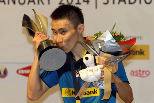 Undisputed. National and world No.1 badminton player Lee Chong Wei kisses the Malaysian Open trophy after securing his record 10th home title on Sunday. he beat Indonesian Tommy Sugiarto in straight sets in the final.