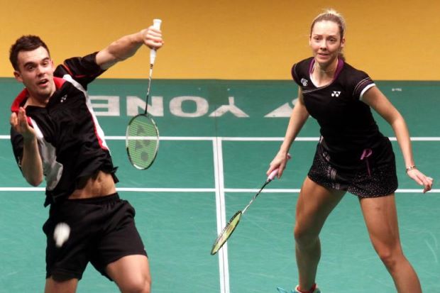 Chris (left) and Gabrielle Adcock in action against Germany’s Michael Fuchs-Birgit Michels during the second round of the Maybank Malaysian Open at the Putra Stadium in Bukit Jalil on Jan 16, 2014. The Adcocks won 23-21, 16-21, 21-6.