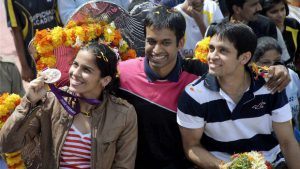 Saina Nehwal (left), and Gopichand (center) and P Kashyap will form a solid Uber-Thomas Cup team.