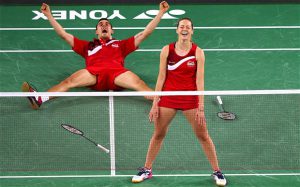 Unbelievable: Chris and Gabby Adcock enjoy their moment after winning Commonwealth mixed doubles gold in Glasgow