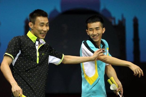 Lee Chong Wei (left) and Chong Wei Feng enjoy a lighter moment during a practice session