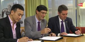 BWF President Poul-Erik Høyer Larsen (right) signs the agreement with Total energy