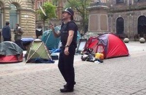 Manchester police play badminton with homeless protesters 2.