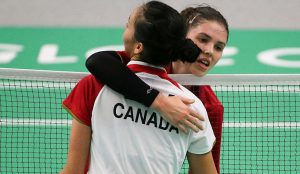 Rachel Honderich (rear) hugs compatriot Michelle Li, after the 2015 Pan Am women's singles final match. (photo: Reuters)