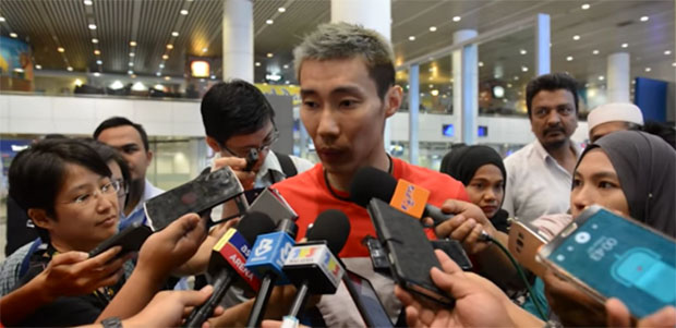 Lee Chong Wei talks to reporters upon his arrival in Kuala Lumpur.