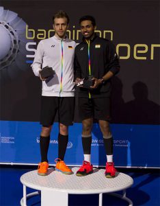 Marc Zwiebler and H. S Prannoy (right) pose for pictures during the podium ceremony after the 2016 Swiss Open men's final. (photo: Swiss Open)