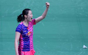 China's Li Xuerui celebrates after victory in her women's singles semi-final match against India's Saina Nehwal at the 2016 India Open. (photo: GettyImages)