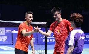 Lin Dan shakes hands with Chen Long after winning his 6th China Masters title. (photo: AFP)