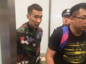 Lee Chong Wei arrives at Chongqing airport.