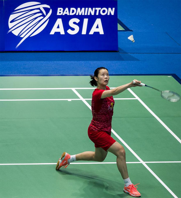 Li Xuerui wins a tought match against Porntip Buranaprasertsuk on Wednesday. (photo: AFP)