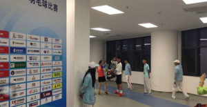 Chen Long carrying his girlfiend Wang Shixian's badminton bag after the China National Games women's team event.
