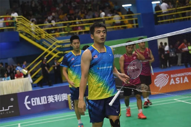 Goh V Shem/Tan Wee Kiong look disappointed with their loss at the 2018 Badminton Asia Team Championships. (photo: Bernama)