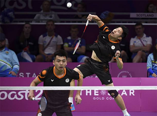 Tan Wee Kiong/Goh V Shem score the winning point for Malaysia against Scotland in the quarter-final of 2018 Commonwealth Games mixed team event. (photo: AP)