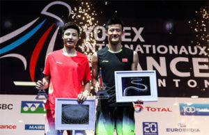 Chen Long (R) celebrates his French Open title with Shi Yuqi. (photo: AFP)