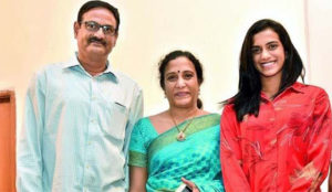 The grownup PV Sindhu and her parents. (photo: Deccan Chronicle)