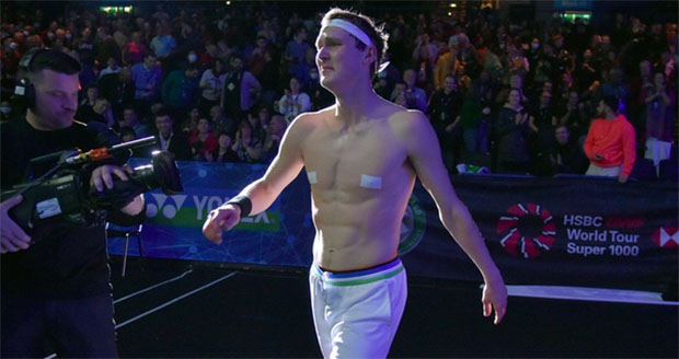 Viktor Axelsen shows nipple covers as he celebrates the All England victory. (photo: AFP)
