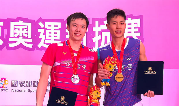 Chou Tien Chen (R) poses for pictures with Wang Tzu Wei at Simulated Tokyo Olympic Games awards ceremony.