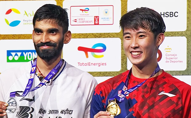 Loh Kean Yew (R) stuns the badminton world by winning the 2021 BWF World Championships.