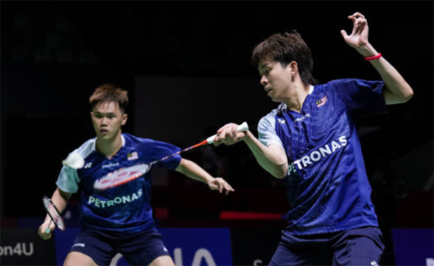 Man Wei Chong and Tee Kai Wun continuing their journey to the third round of World Championships. (photo: Shi Tang/Getty Images)