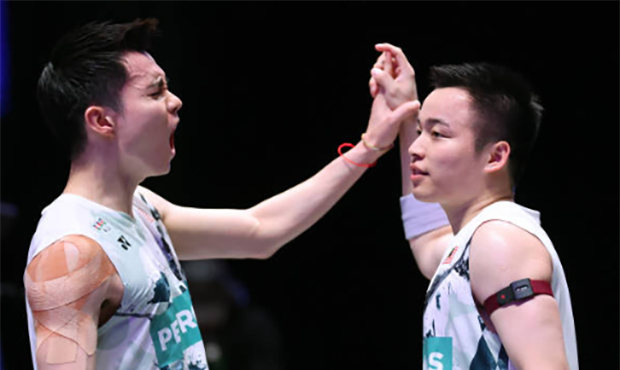 Aaron Chia/Soh Wooi Yik celebrate after winning the 2024 All-England semi-finals. (photo: Catherine Ivill/Getty Images)