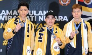 Malaysia's Olympic medalists Lee Zii Jia, Aaron Chia, and Soh Wooi Yik were greeted with a hero's welcome upon their return to Malaysia. (Photo: Bernama)