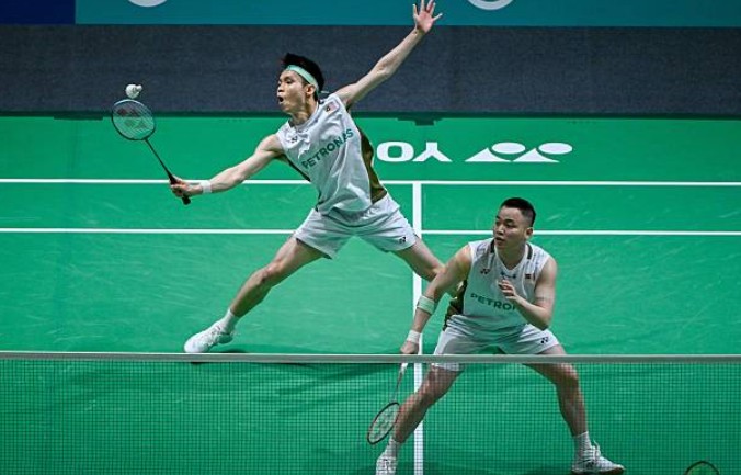 Aaron Chia and Soh Wooi Yik advance into the quarterfinals of the 2026 India Open. (Photo: Xinhua)