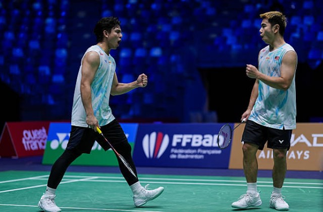 Goh Sze Fei and Nur Izzuddin celebrate after securing a hard-fought victory to reach the quarter-finals of the 2026 Indonesia Masters in Jakarta. (Photo: AFP)