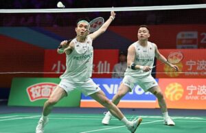 Malaysia’s Aaron Chia and Soh Wooi Yik compete in a tense quarterfinal match at the Badminton Asia Championships in Ningbo. (Photo: AFP)